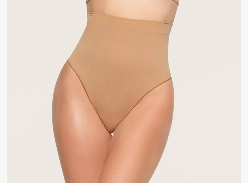New skims core thong with straps ochre size small